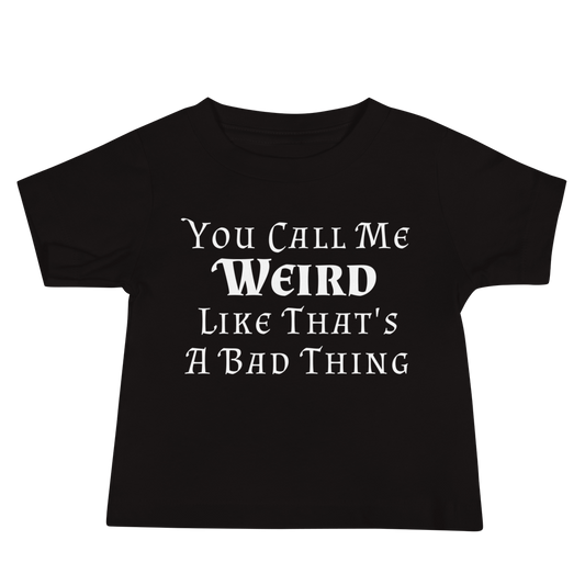 "You Call Me Weird Like That's A Bad Thing" printed on a black baby jersey short sleeve tee laying on a flat surface