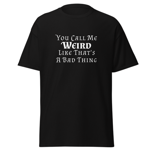 "You Call Me Weird Like That's A Bad Thing" printed on a black unisex classic tee laying on a flat surface