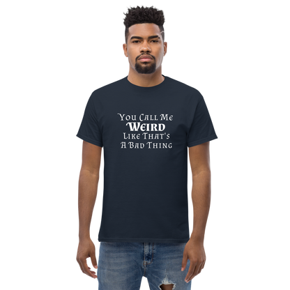 "You Call Me Weird Like That's A Bad Thing" printed on a navy unisex classic tee worn by a male