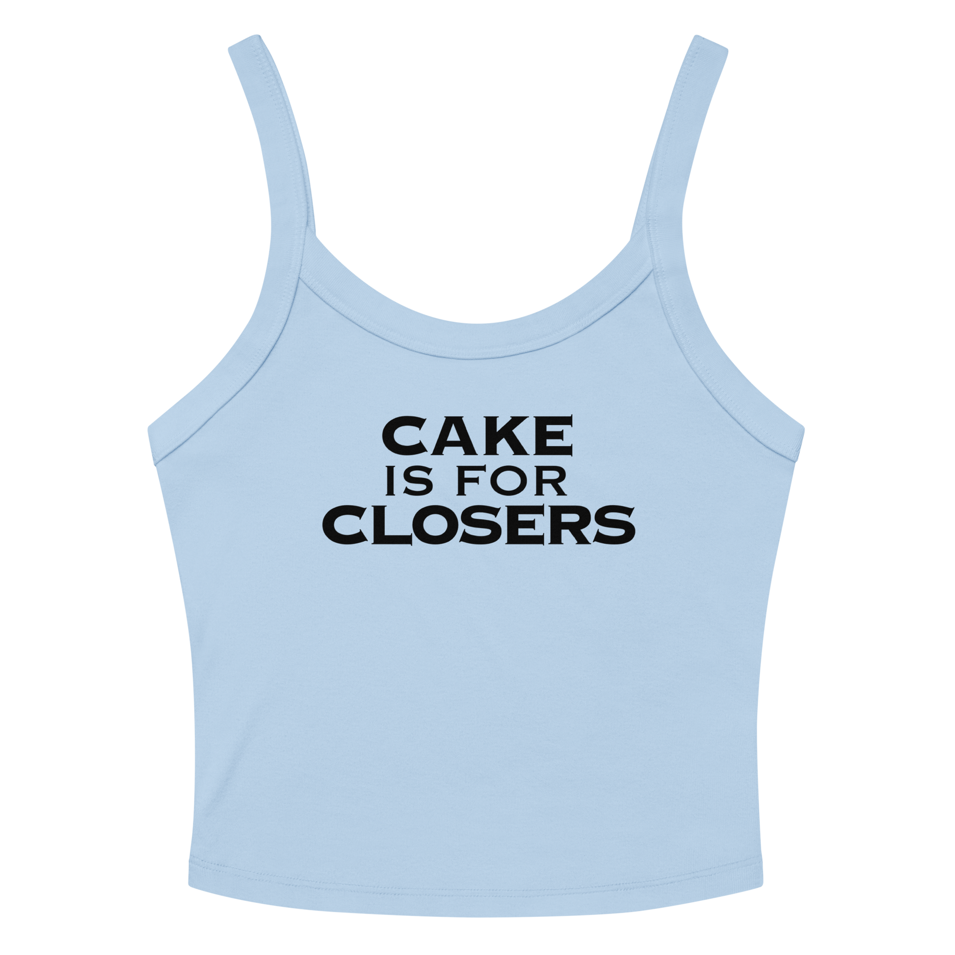 "Cake Is For Closers" printed on a solid baby blue blend women's micro-rib tanktop laying on a flat surface amongst sunglasses and shorts