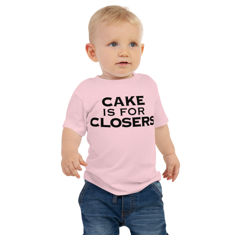 "Cake Is For Closers" printed on a pink baby jersey short sleeve tee worn by a male