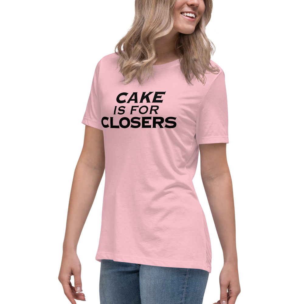 "Cake Is For Closers" printed on a pink women's relaxed t-shirt worn by a female