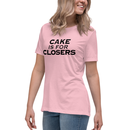 "Cake Is For Closers" printed on a pink women's relaxed t-shirt worn by a female