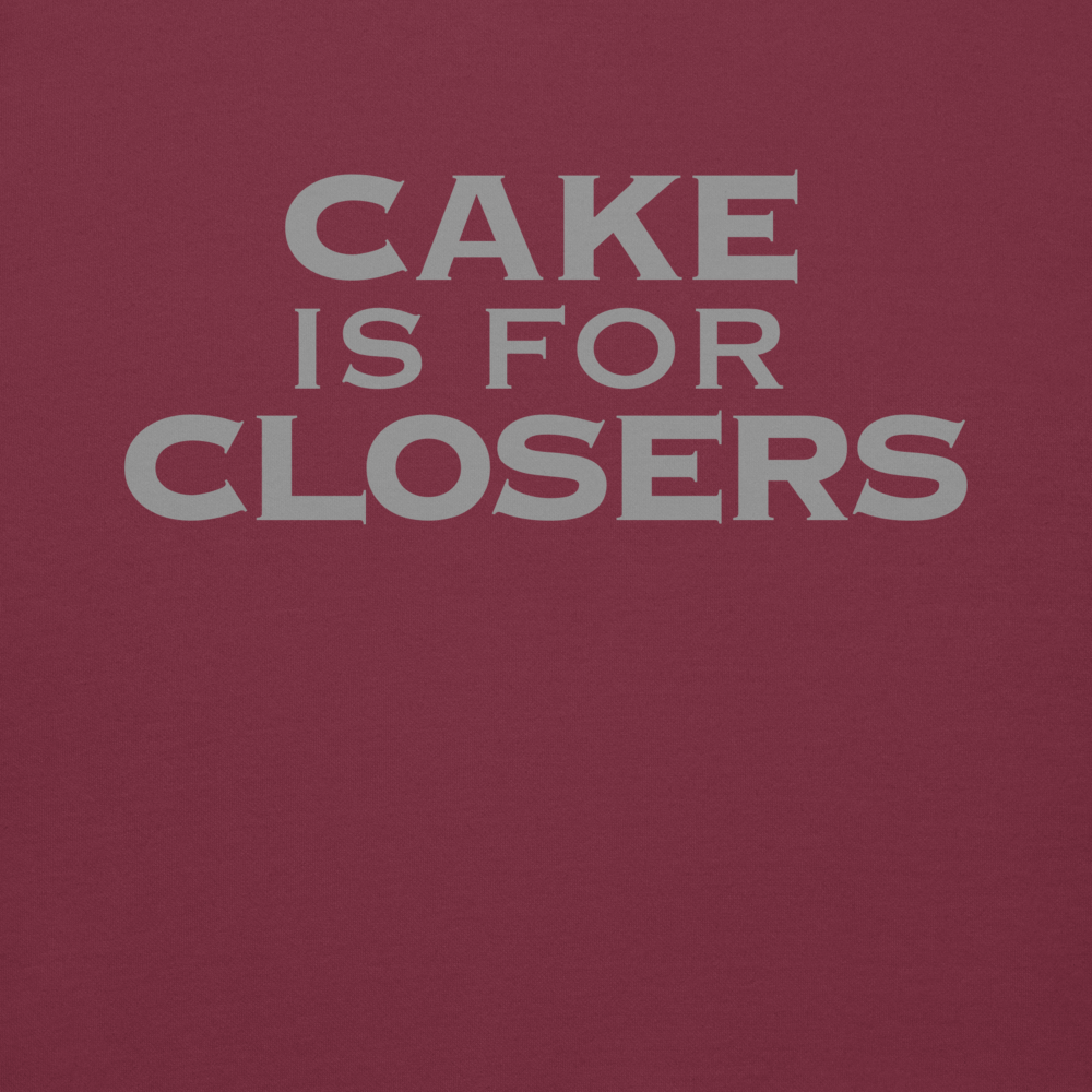 "Cake Is For Closers" printed on a maroon background