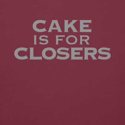 "Cake Is For Closers" printed on a maroon background