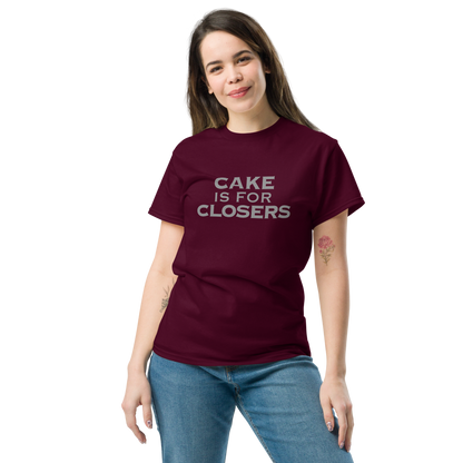"Cake Is For Closers" printed on a maroon unisex classic tee worn by a female