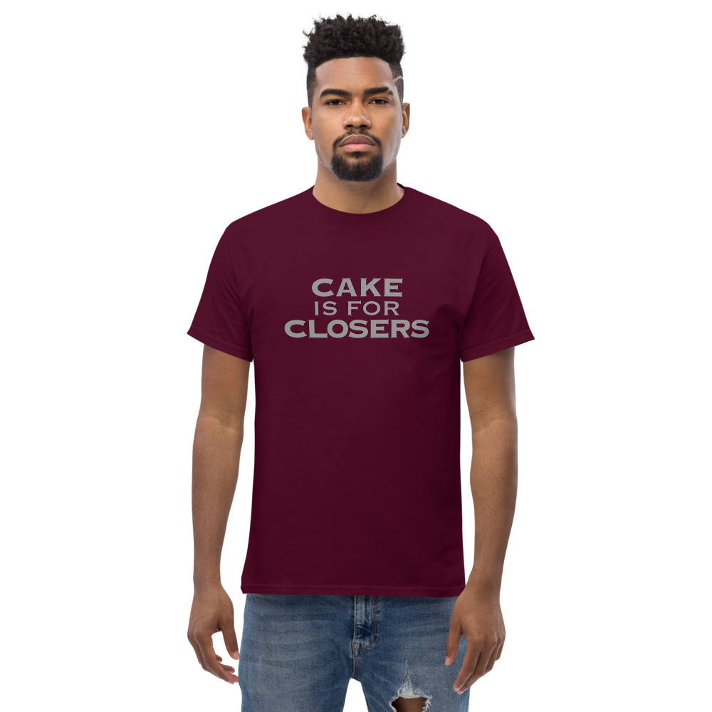 "Cake Is For Closers" printed on a maroon unisex classic tee worn by a male