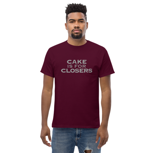 "Cake Is For Closers" printed on a maroon unisex classic tee worn by a male