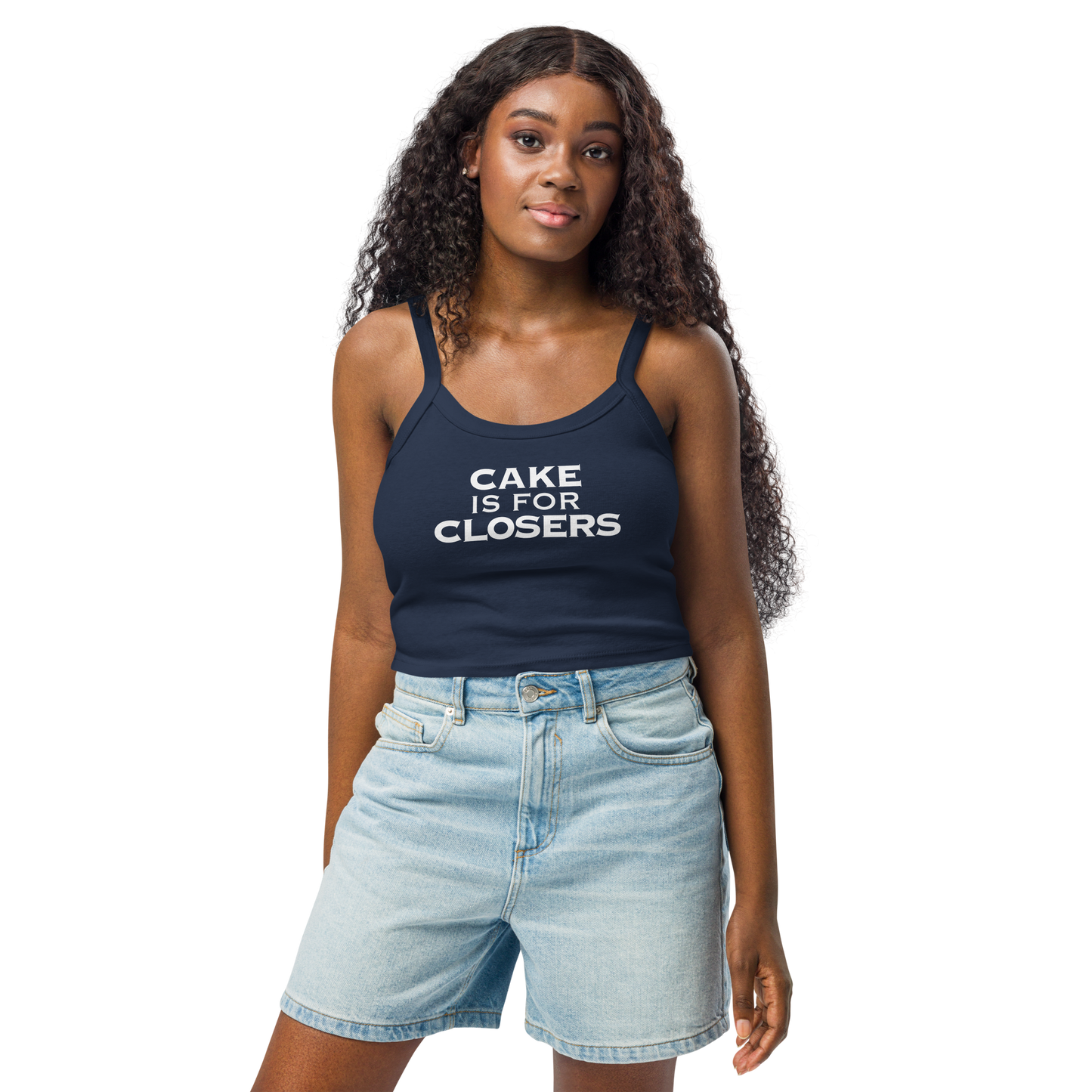 "Cake Is For Closers" printed on a solid navy blend women's micro-rib tanktop worn by a female