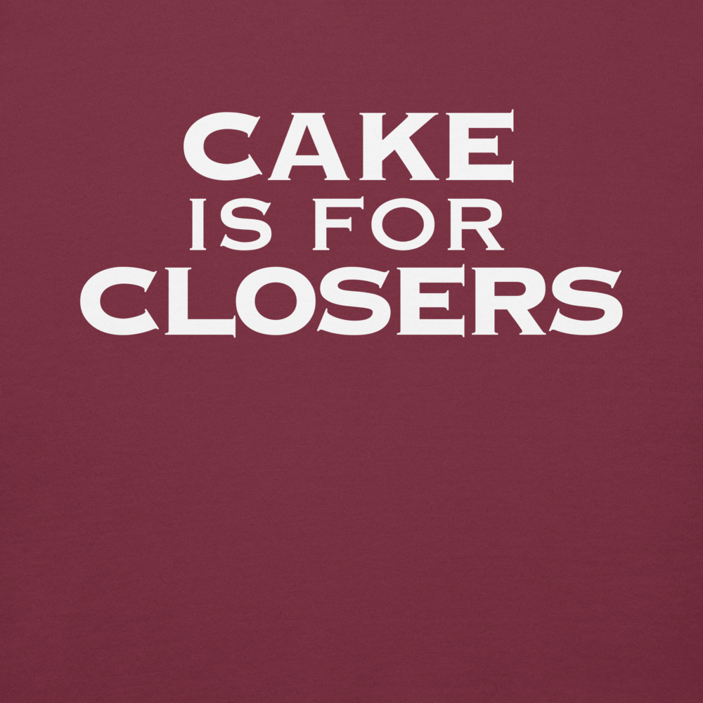 "Cake Is For Closers" printed on a maroon background