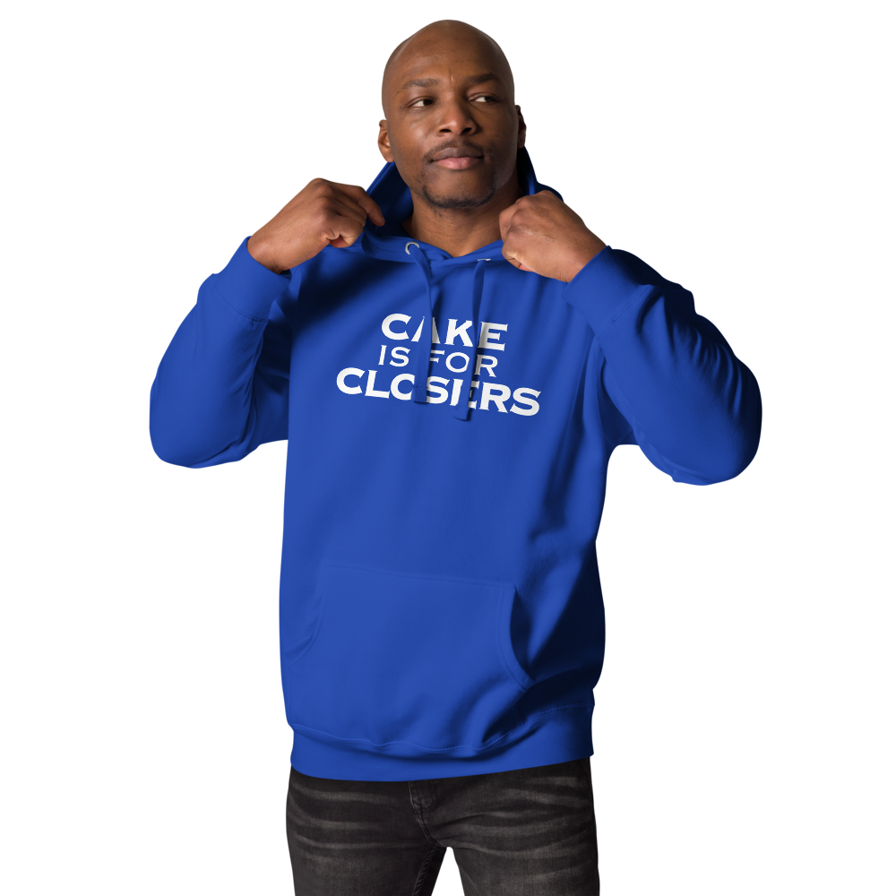 "Cake Is For Closers" printed on a team royal unisex hoodie worn by a male