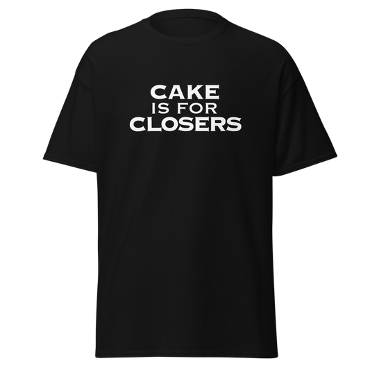 "Cake Is For Closers" printed on a black unisex classic tee laying on a flat surface