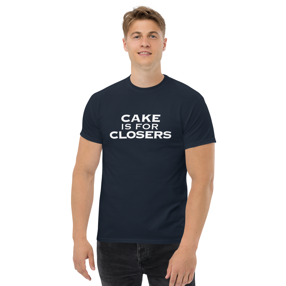 "Cake Is For Closers" printed on a navy unisex classic tee worn by a male