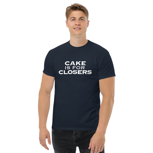 "Cake Is For Closers" printed on a navy unisex classic tee worn by a male