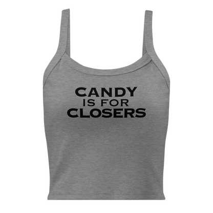 "Candy Is For Closers" printed on a athletic heather women's micro-rib tanktop laying on a flat surface