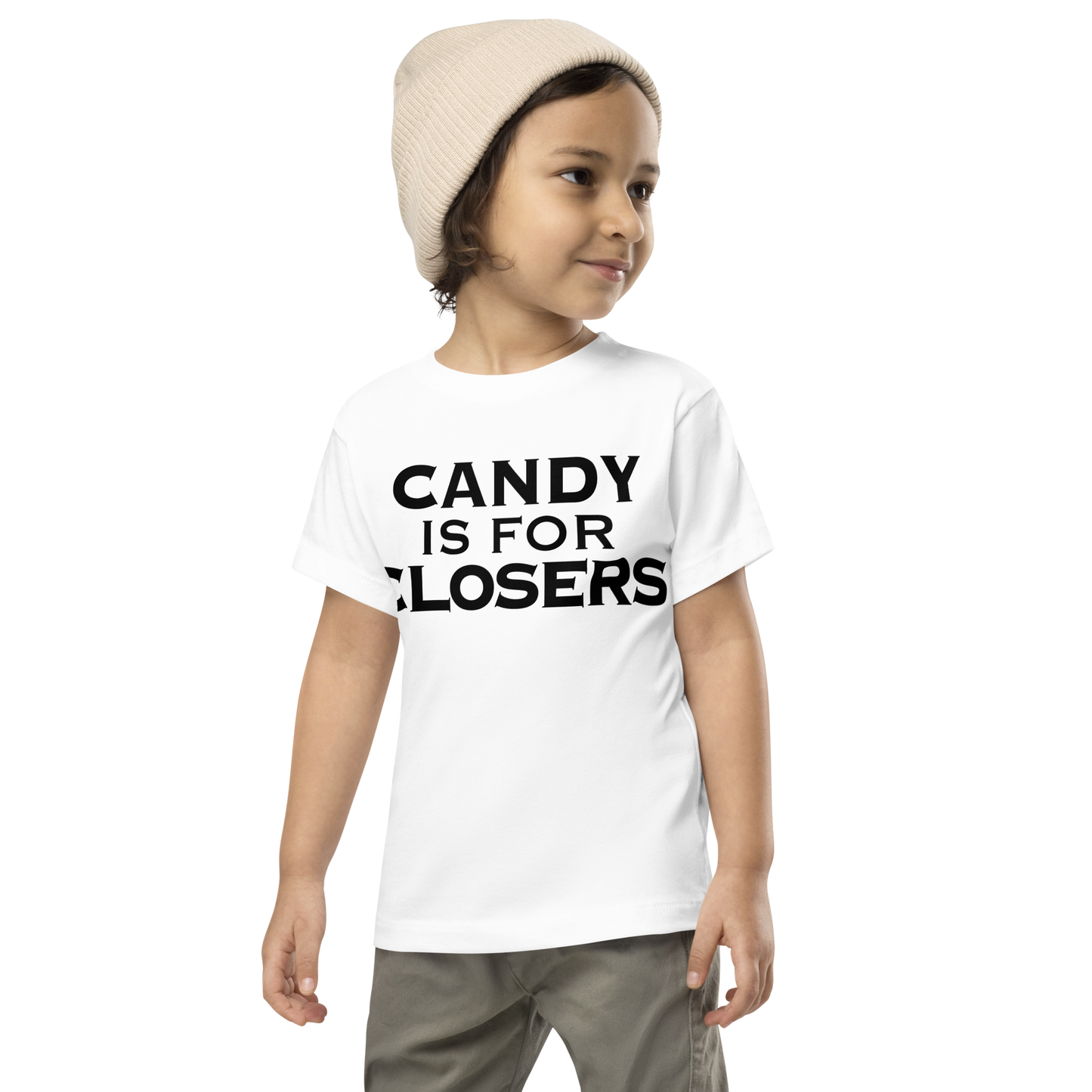 "Candy Is For Closers" printed on a white toddler short sleeve tee worn by a male wearing a cap