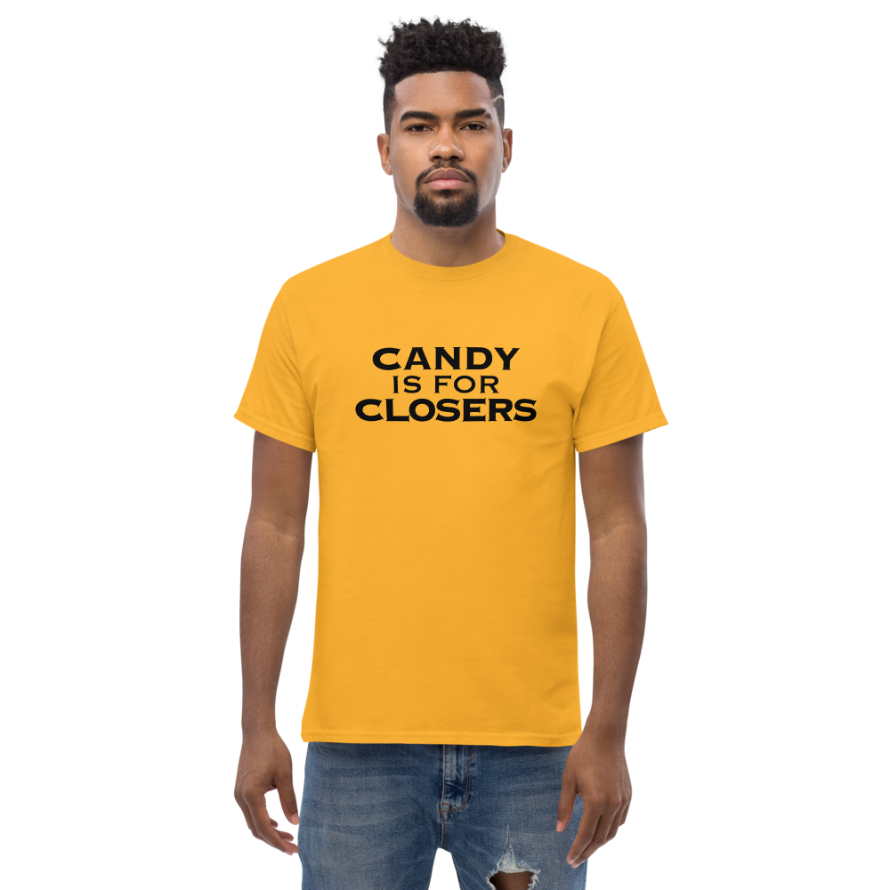 "Candy Is For Closers" printed on a gold unisex classic tee worn by a male