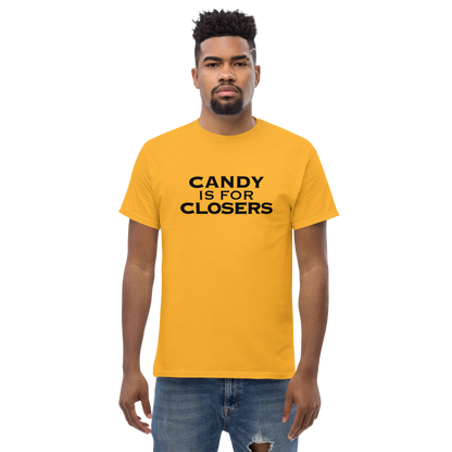 "Candy Is For Closers" printed on a gold unisex classic tee worn by a male