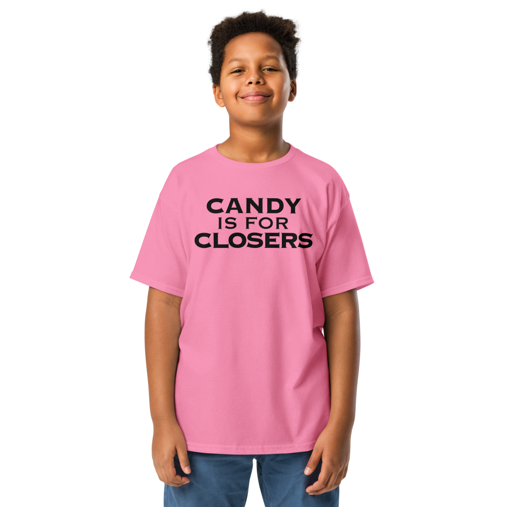 "Candy Is For Closers" printed on a azalea youth classic tee worn by a male