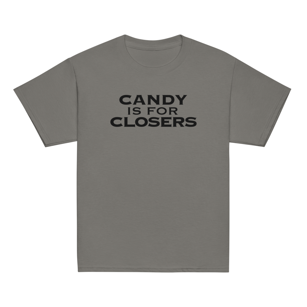 "Candy Is For Closers" printed on a charcoal youth classic tee laying on a flat surface