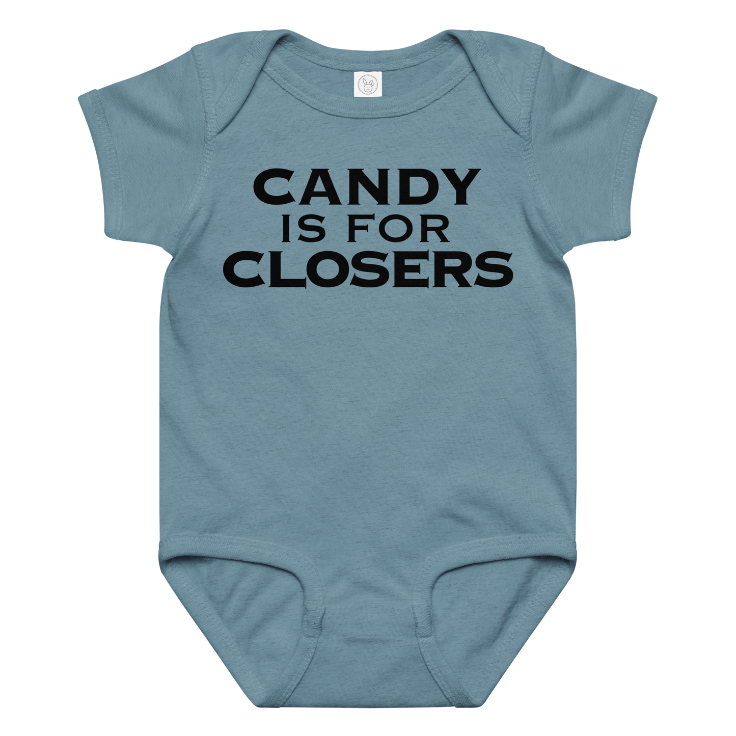"Candy Is For Closers" printed on a vintage indigo baby jersey bodysuit laying on a flat surface amongst other clothes