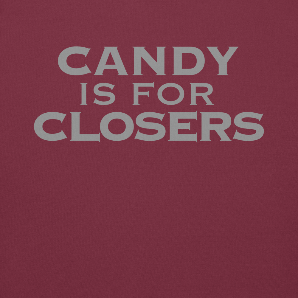 "Candy Is For Closers" printed on a maroon background
