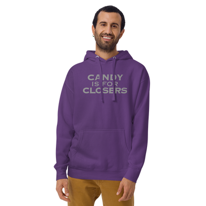 "Candy Is For Closers" printed on a purple warn by a male