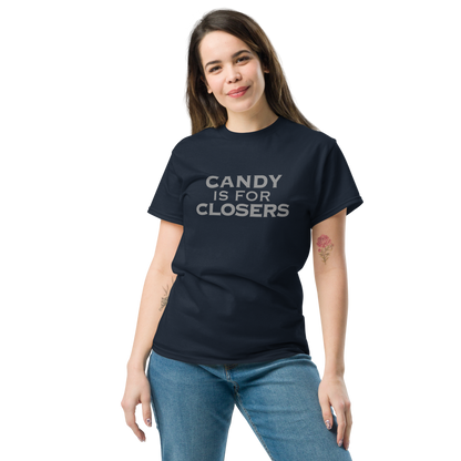 "Candy Is For Closers" printed on a navy unisex classic tee worn by a female