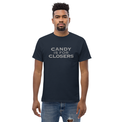 "Candy Is For Closers" printed on a navy unisex classic tee worn by a male