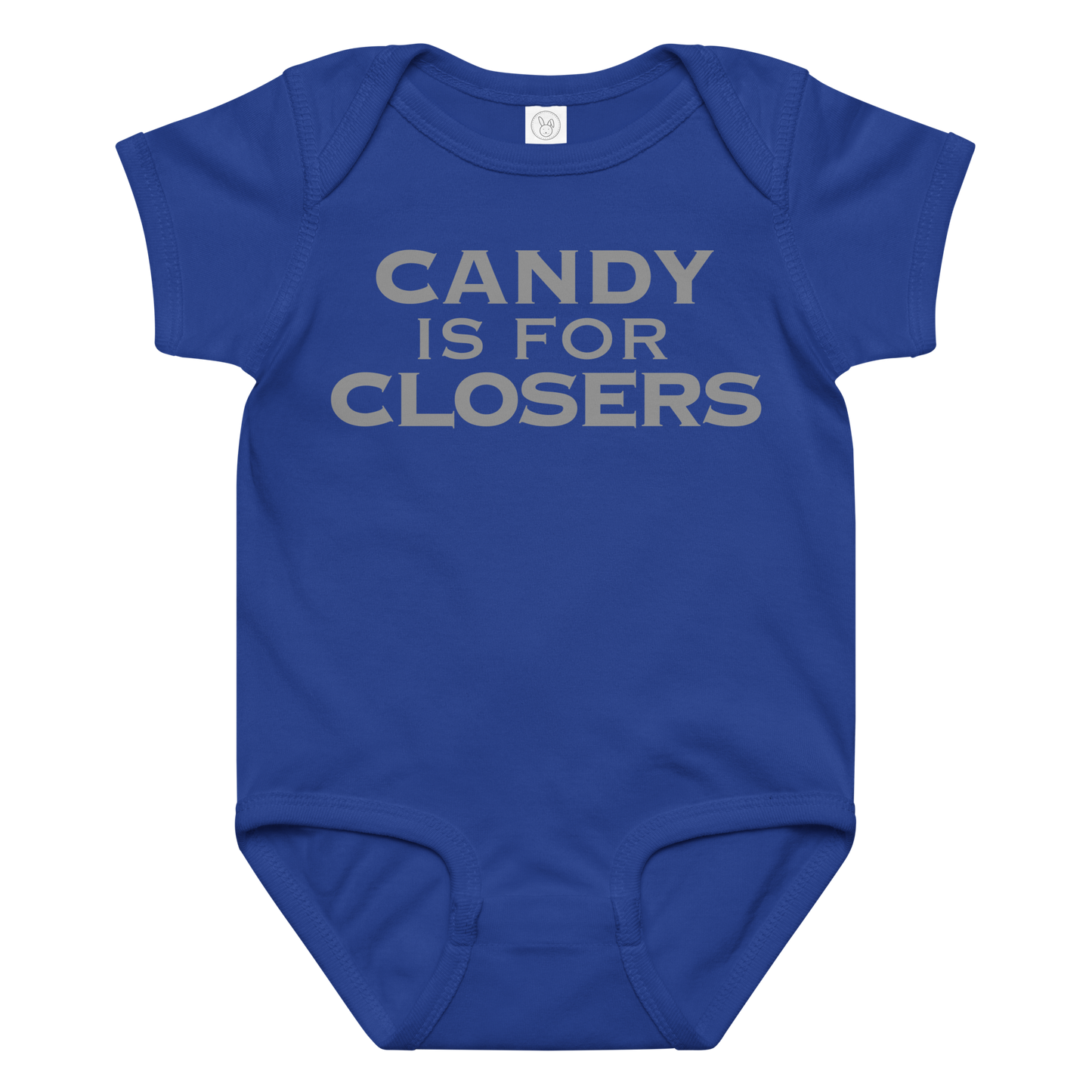 "Candy Is For Closers" printed on a royal baby jersey bodysuit laying on a flat surface amongst other clothes