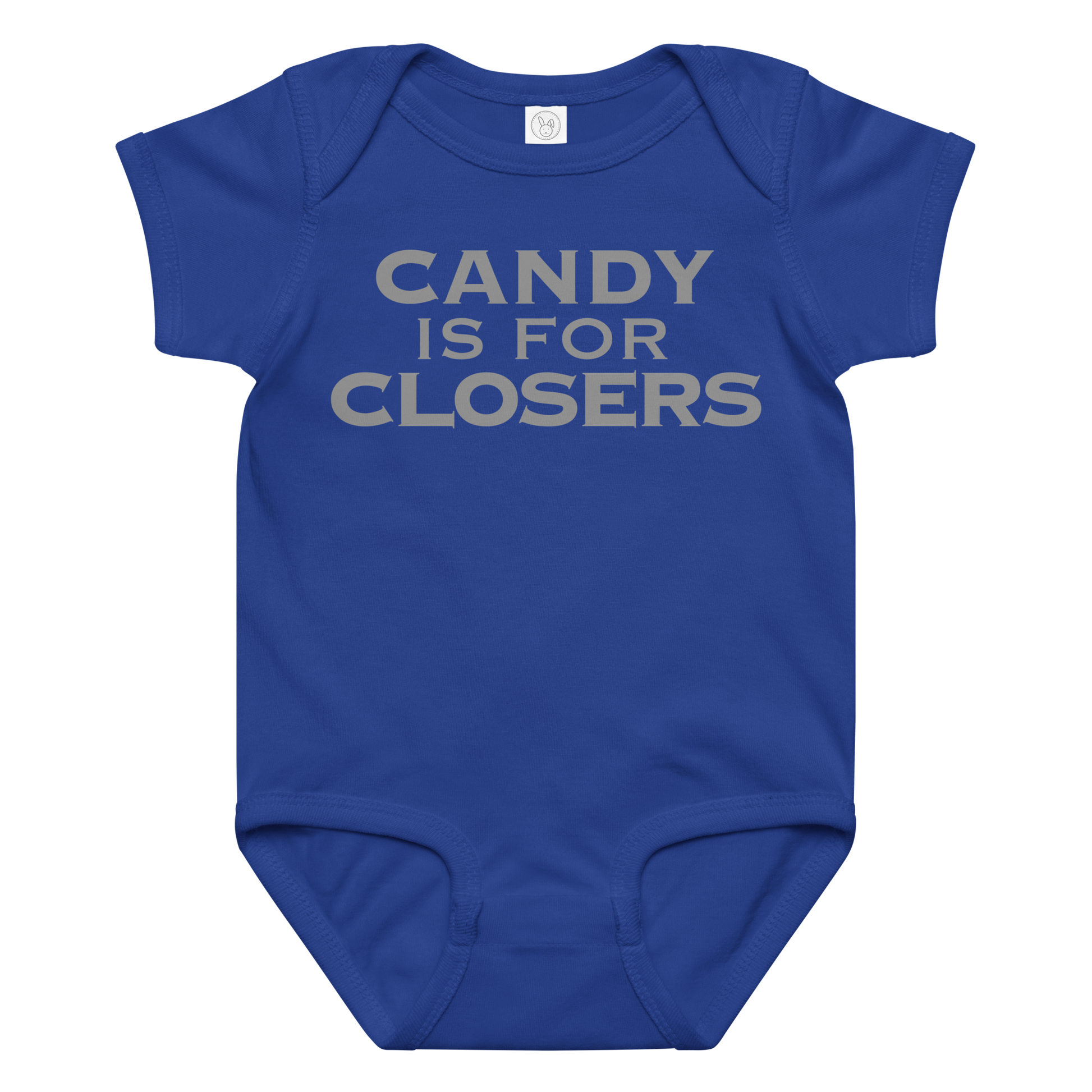 "Candy Is For Closers" printed on a royal baby jersey bodysuit laying on a flat surface amongst other clothes