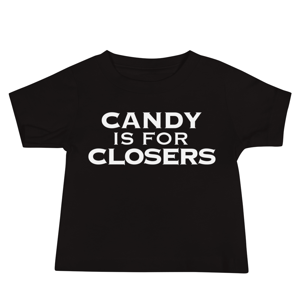 "Candy Is For Closers" printed on a black baby jersey short sleeve tee laying on a flat surface