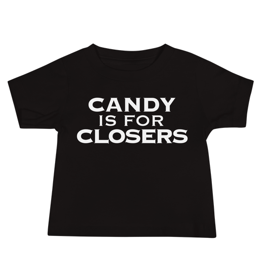 "Candy Is For Closers" printed on a black baby jersey short sleeve tee laying on a flat surface