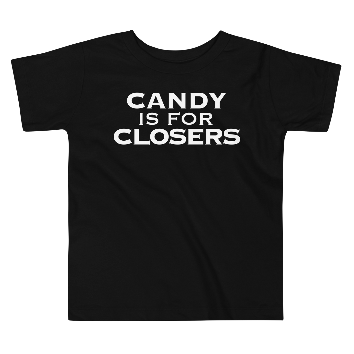 "Candy Is For Closers" printed on a black toddler short sleeve tee laying on a flat surface
