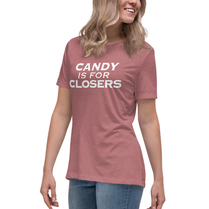 "Candy Is For Closers" printed on a heather mauve women's relaxed t-shirt worn by a female