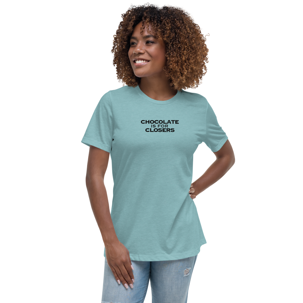 "Chocolate Is For Closers" printed on a heather blue lagoon women's relaxed t-shirt worn by a female