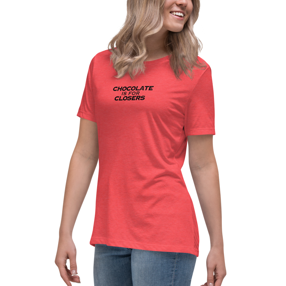 "Chocolate Is For Closers" printed on a heather red women's relaxed t-shirt worn by a female
