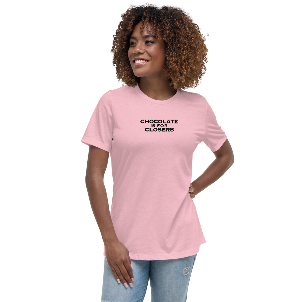"Chocolate Is For Closers" printed on a pink women's relaxed t-shirt worn by a female