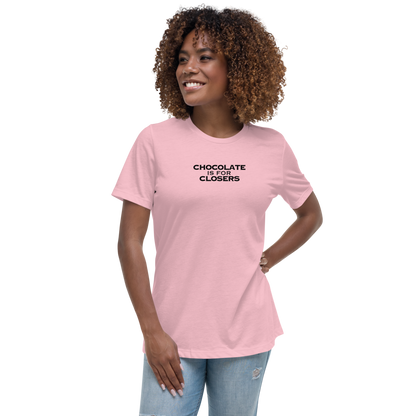 "Chocolate Is For Closers" printed on a pink women's relaxed t-shirt worn by a female