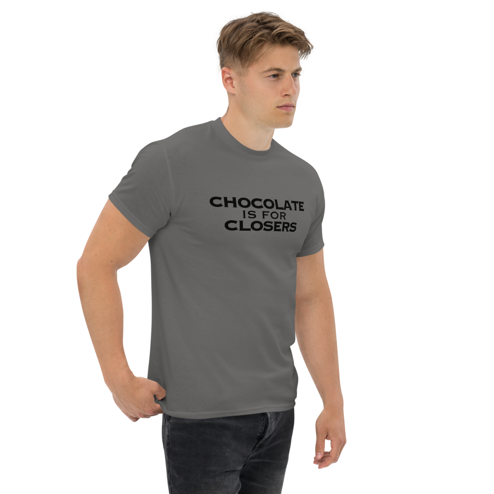 "Chocolate Is For Closers" printed on a charcoal unisex classic tee worn by a male