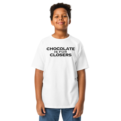 "Chocolate Is For Closers" printed on a white youth classic tee worn by a male