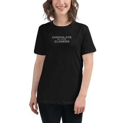 "Chocolate Is For Closers" printed on a black women's relaxed t-shirt worn by a female