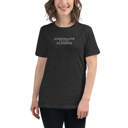 "Chocolate Is For Closers" printed on a dark grey heather women's relaxed t-shirt worn by a female