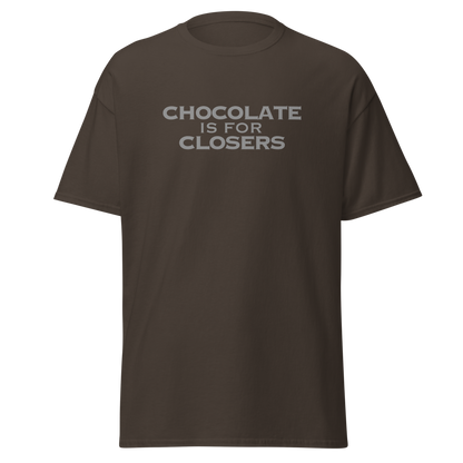 "Chocolate Is For Closers" printed on a dark chocolate on an invisible body