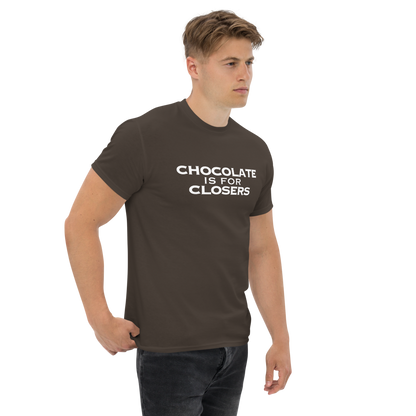 "Chocolate Is For Closers" printed on a dark chocolate unisex classic tee worn by a male