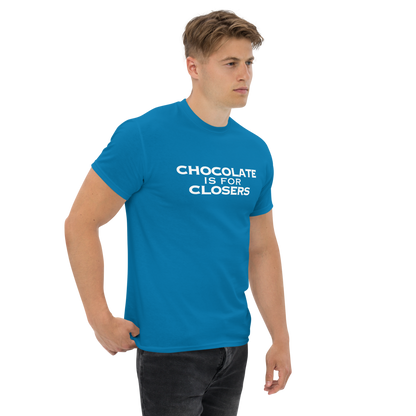 "Chocolate Is For Closers" printed on a sapphire unisex classic tee worn by a male