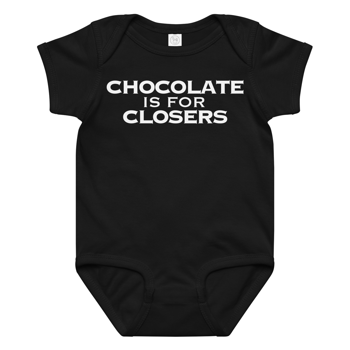 "Chocolate Is For Closers" printed on a black baby jersey bodysuit laying on a flat surface amongst other clothes