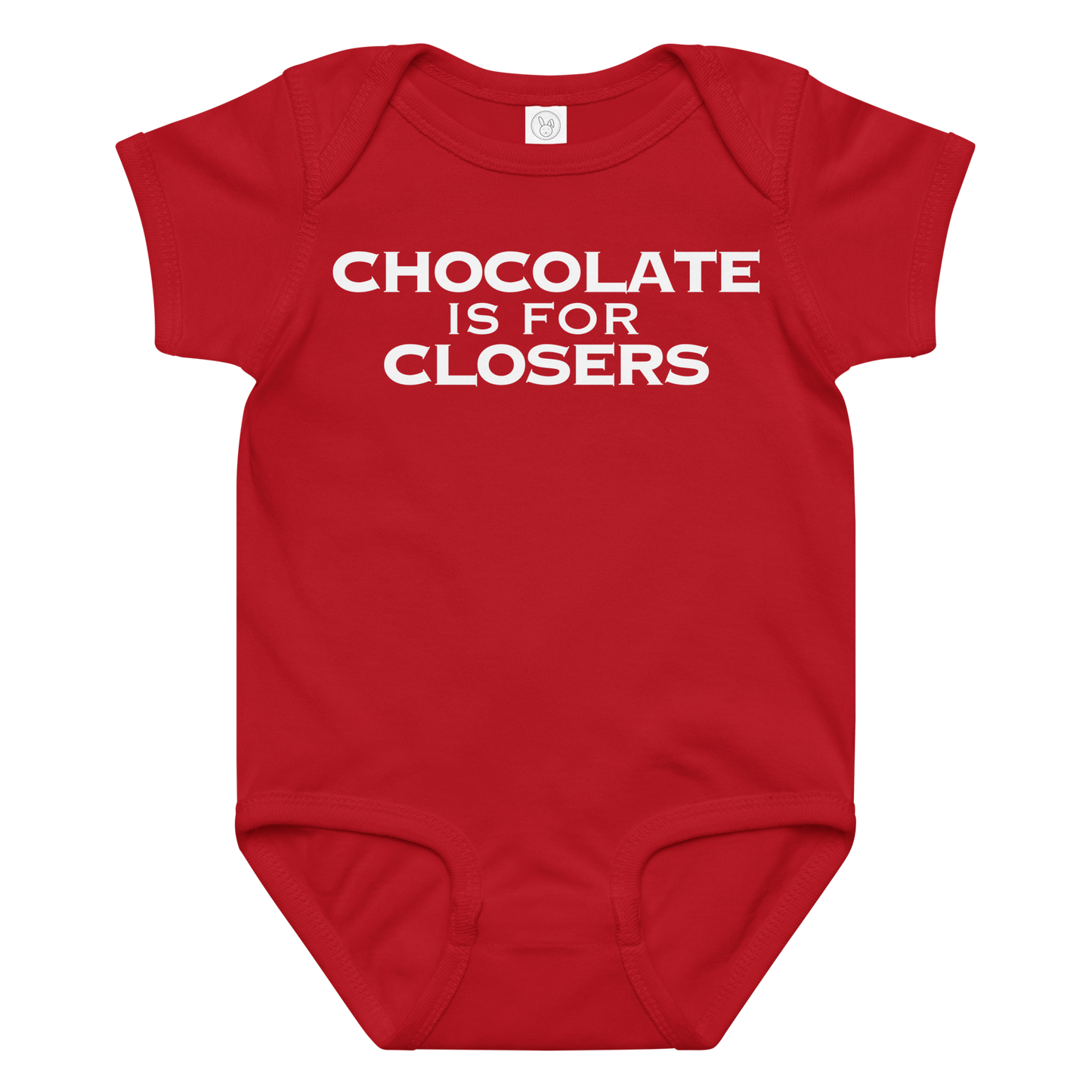 "Chocolate Is For Closers" printed on a red baby jersey bodysuit laying on a flat surface amongst other clothes
