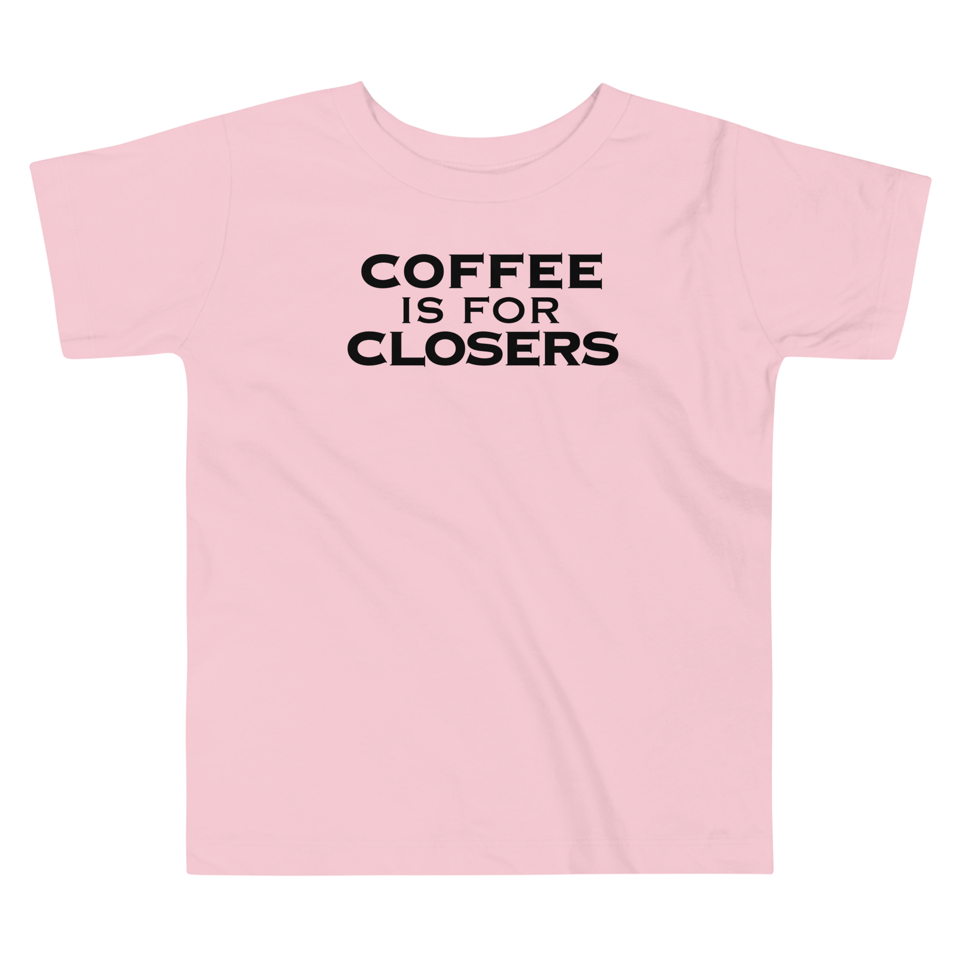 "Coffee Is For Closers" printed on a pink toddler short sleeve tee laying on a flat surface