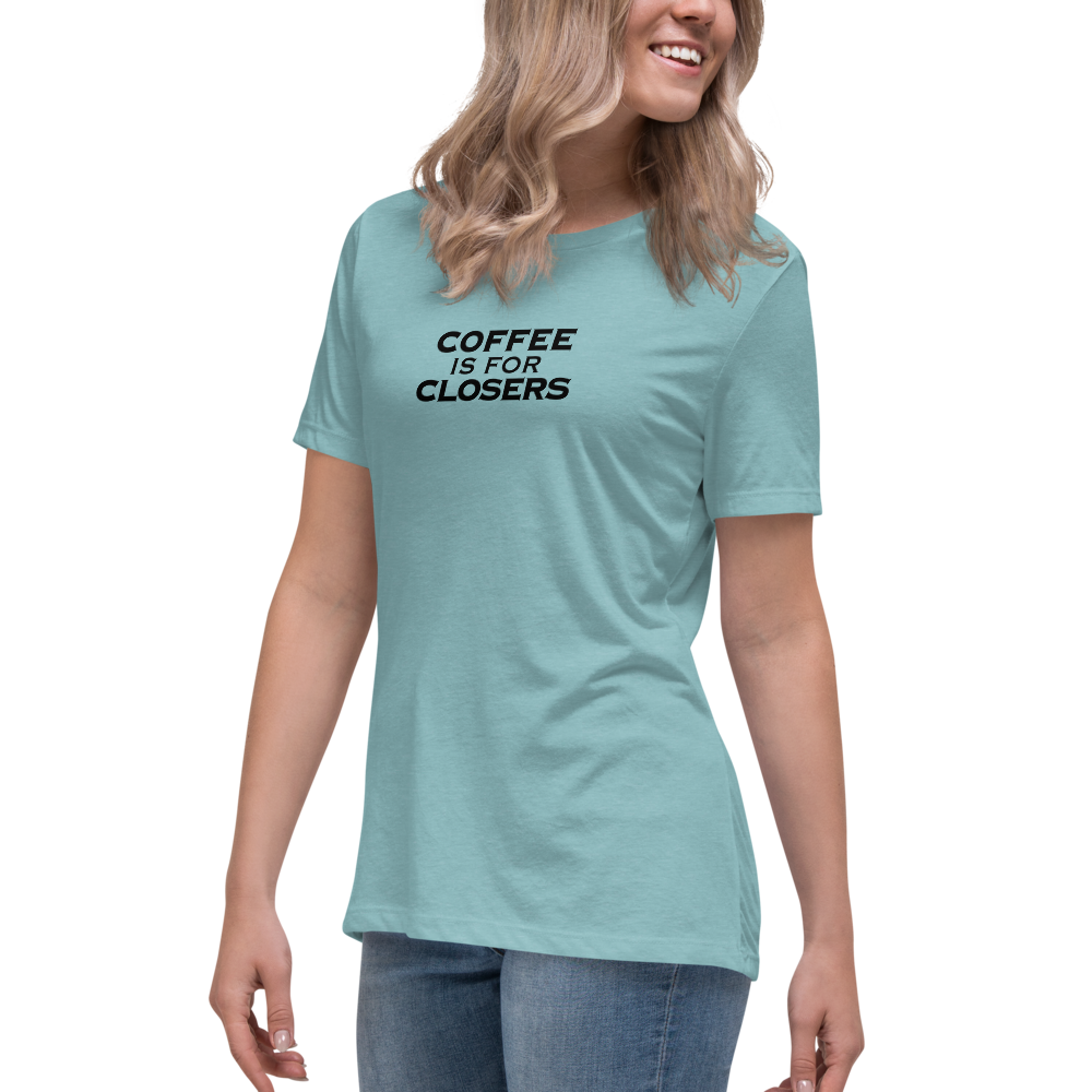 "Coffee Is For Closers" printed on a heather blue lagoon women's relaxed t-shirt worn by a female